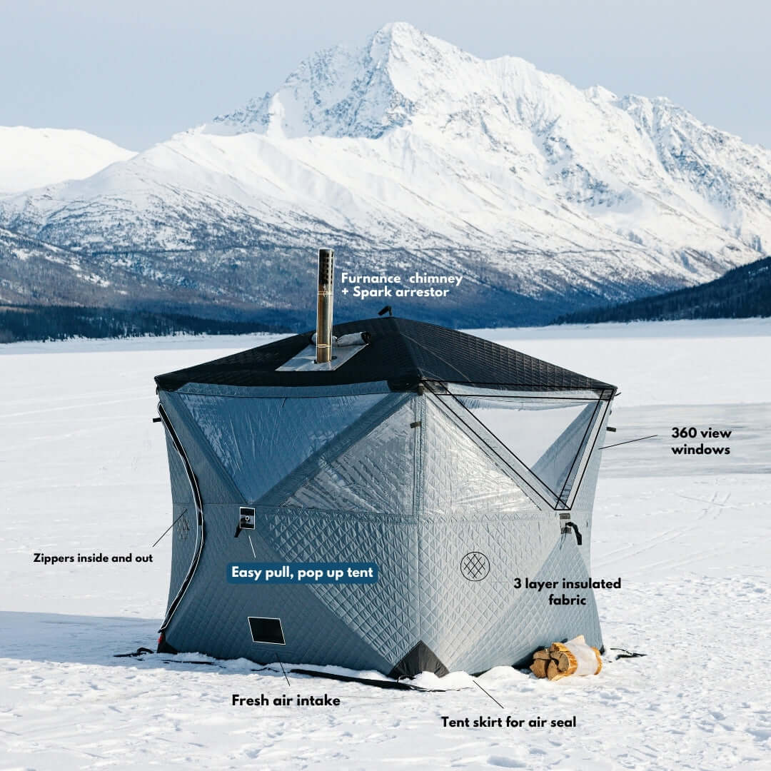 Arctic gray KYFE portable sauna tent with mountain background – outdoor wood-fired sauna kit