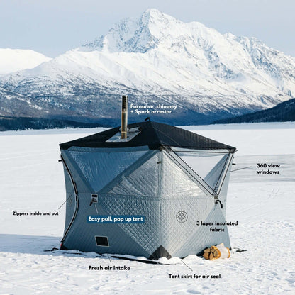 Arctic gray KYFE portable sauna tent with mountain background – outdoor wood-fired sauna kit